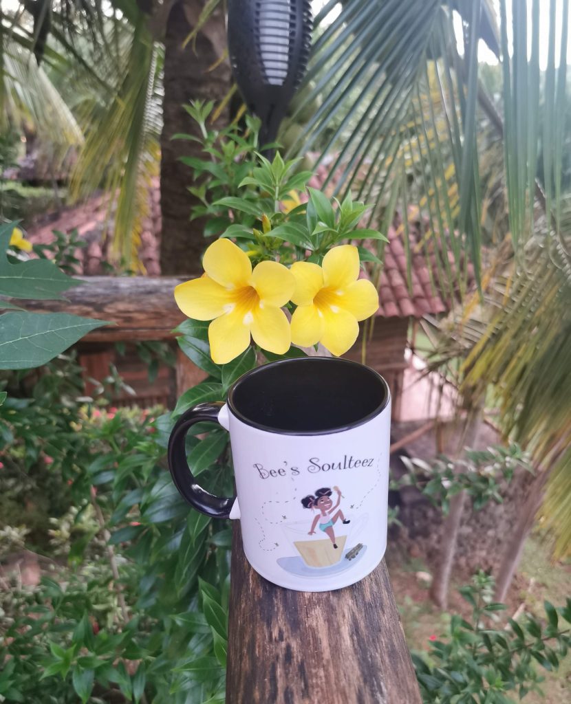 Bea's Mug in front of flowers